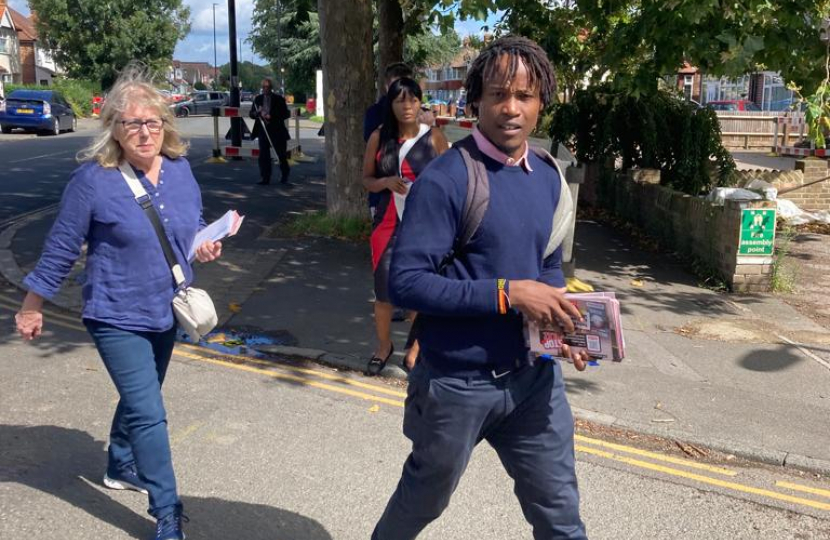 Cllr Ron Mushiso leading Susan Hall AM through Feltham